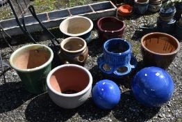 A SELECTION OF GLAZED GARDEN POTS, to include a plant pot, with floral decoration, diameter 38cm x