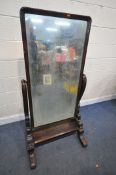 A VICTORIAN MAHOGANY CHEVAL MIRROR, with twin scrolled supports, and scrolled legs, width 78cm x