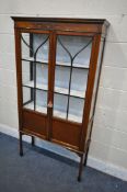 AN EDWARDIAN MAHOGANY AND INLAID TWO DOOR DISPLAY CABINET, width 91cm x depth 30cm x height 168cm (