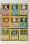 COMPLETE POKEMON BASE SET, includes all 102 cards, condition ranges from good to great