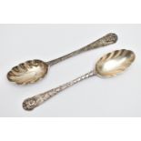 A PAIR OF GEORGE III IRISH SILVER FRUIT SPOONS, worn silver gilt fluted bowls, the handles later