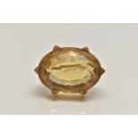 A LATE VICTORIAN 15CT GOLD AND CITRINE BROOCH, oval cut citrine, prong set with six triangular