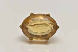 A LATE VICTORIAN 15CT GOLD AND CITRINE BROOCH, oval cut citrine, prong set with six triangular