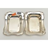 TWO EARLY 20TH CENTURY SILVER BONBON DISHES, each of a rectangular from with wavy edges,