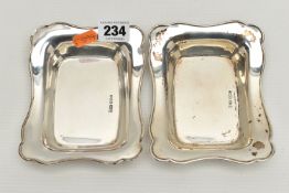 TWO EARLY 20TH CENTURY SILVER BONBON DISHES, each of a rectangular from with wavy edges,