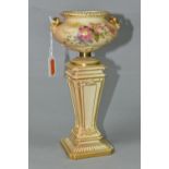 A ROYAL WORCESTER BLUSH IVORY TWIN HANDLED VASE ON PLINTH, model no 1948, bearing grey printed