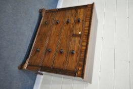 A GEORGIAN MAHOGANY CHEST OF TWO SHORT OVER THREE LONG GRADUATED DRAWERS, and a secret drawer, on