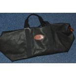 A BLACK AND COGNAC MULBERRY MEDIUM SIZED TRAVEL BAG, printed Scotchgrain, classic Mulberry tartan
