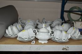 A GROUP OF GERMAN HUTSCHENREUTHER 'SYLVIA' DESIGN WHITE TEAWARE, comprising twelve breakfast cups,