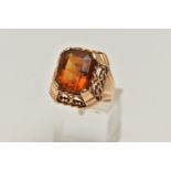 A FRENCH GOLD AND CITRINE RING, rectangular cut deep orange citrine, prong set in yellow gold, a