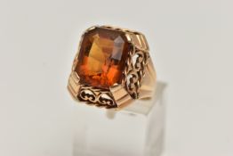 A FRENCH GOLD AND CITRINE RING, rectangular cut deep orange citrine, prong set in yellow gold, a