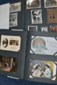 TWO ALBUMS OF POSTCARDS / PHOTOGRAPHS containing approximately 507 miscellaneous subjects to include
