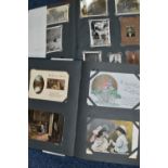 TWO ALBUMS OF POSTCARDS / PHOTOGRAPHS containing approximately 507 miscellaneous subjects to include