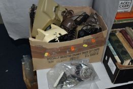 A QUANTITY OF ASSORTED TELEPHONE PARTS AND FITTINGS, internal parts, dials, casings, handsets