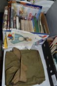ONE BOX OF MILITARY & SCOUTING EPHEMERA to include badges, a pendant, Military books, 'Picture