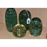 FOUR LARGE VICTORIAN GREEN DUMP GLASS PAPERWEIGHTS, comprising two tall controlled bubble design