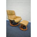 AN EKORNES STRESSLESS TAN LEATHER RECLINING SWIVEL ARMCHAIR, and footstool (condition report: -