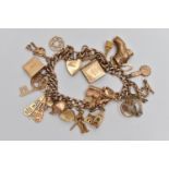 A 9CT GOLD CHARM BRACELET, curb link bracelet, links stamped 9.375, fitted with twenty six charms in