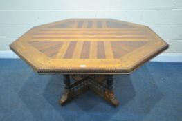 AN EARLY 20TH CENTURY WALNUT OCTAGONAL LIBRARY CENTRE TABLE, in the manner of A.W.N Pugin, the