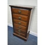 A TALL EARLY 20TH CENTURY OAK CHEST OF SIX DRAWERS, width 56cm x depth 42cm x height 110cm (