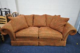 AN ORANGE PATTERNED TWO SEATER SETTEE, length 230cm x depth 120cm x height 83cm (condition
