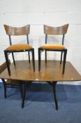 A MID-CENTURY G PLAN TOLA AND BLACK DROP LEAF DINING TABLE, on an ebonised base, open length 138cm x
