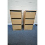 A PAIR OF BEECH EFFECT THREE DRAWER FILING CABINETS, width 58cm x 66cm x height 104cm (condition -