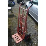 A RED CLARKE STRONGARM SACK TRUCK (condition - rust, signs of usage, tyres flat)