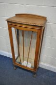 AN OAK CHINA CABINET, on ball and claw feet, width 55cm x depth 30cm x height 119cm (condition