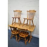 AN PINE TRESTLE KITCHEN TABLE, length 137cm x depth 76cm x height 74cm, and four pine chairs (