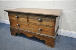 A LOW GEORGIAN OAK CHEST OF TWO SHORT OVER A SINGLE DRAWER, on tall bracket feet, width 115cm x