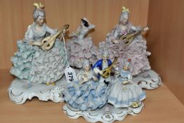 THREE SANDIZELL FIGURES/GROUP AND A SIMILAR FIGURE, comprising two Sandizell female musician
