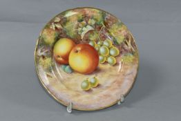 A ROYAL WORCESTER HAND PAINTED FRUIT STUDY SIDE PLATE, signed (John) Freeman, painted with apples