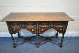 AN EARLY 20TH CENTURY OAK SIDEBOARD, with two drawers, on turned legs, united by two cross