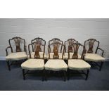 A SET OF EIGHT GEORGE III MAHOGANY HEPPLEWHITE STYLE DINING CHAIRS, with a pierced splat back and