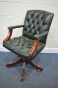 A GREEN BUTTONED LEATHER OFFICE CHAIR, with open armrests (condition report - both arms with