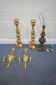 A PAIR OF GILTWOOD ALTER CANDLE STICKS, a pair of wall sconces with triple holders, and a wooden