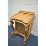 A VICTORIAN STYLE PINE DAVENPORT, with four drawers to each side, width 56cm x depth 57cm x height