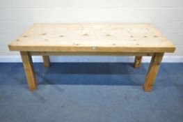 A LARGE RUSTIC FINISH DINING TABLE, on block legs, length 202cm x depth 88cm x height 82cm (