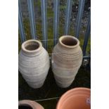 TWO UNFINISHED CYLINDRICAL TERRACOTTA POTS, largest height 76cm (condition - possibly homemade/