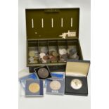 A MONEY TIN WITH COINAGE AND COMMEMORATIVES, coins to include a 1957 Half Crown, One Shillings,