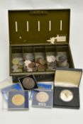 A MONEY TIN WITH COINAGE AND COMMEMORATIVES, coins to include a 1957 Half Crown, One Shillings,