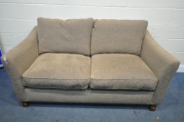 A UNBRANDED BROWN UPHOLSTERED TWO SEATER SETTEE, length 181cm x depth 98cm x height 76cm (