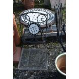 A WROUGHT IRON THREE PIECE BISTRO SET, to include a circular table with mosaic top, 60cm x height