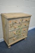 A VICTORIAN PINE CHEST OF TWO SHORT OVER THREE LONG DRAWERS, with painted floral decoration, on