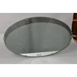 A BRITISH RAIL EASTERN WALL MIRROR, oval form, silver transfer print in silver at centre of bottom