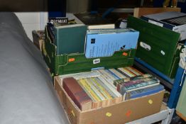 FOUR BOXES OF BOOKS, containing approximately 140 titles in hardback and paperback formats from