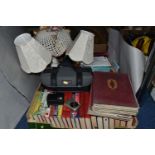 TWO BOXES OF BOOKS, LAMPS AND CAMERAS, to include a pair of bedside lamps, a ceramic table lamp with
