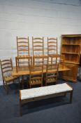 A PINE TRESTLE DINING TABLE, length 183cm x depth 80cm x height 73cm, six Ercol ladderback chairs,