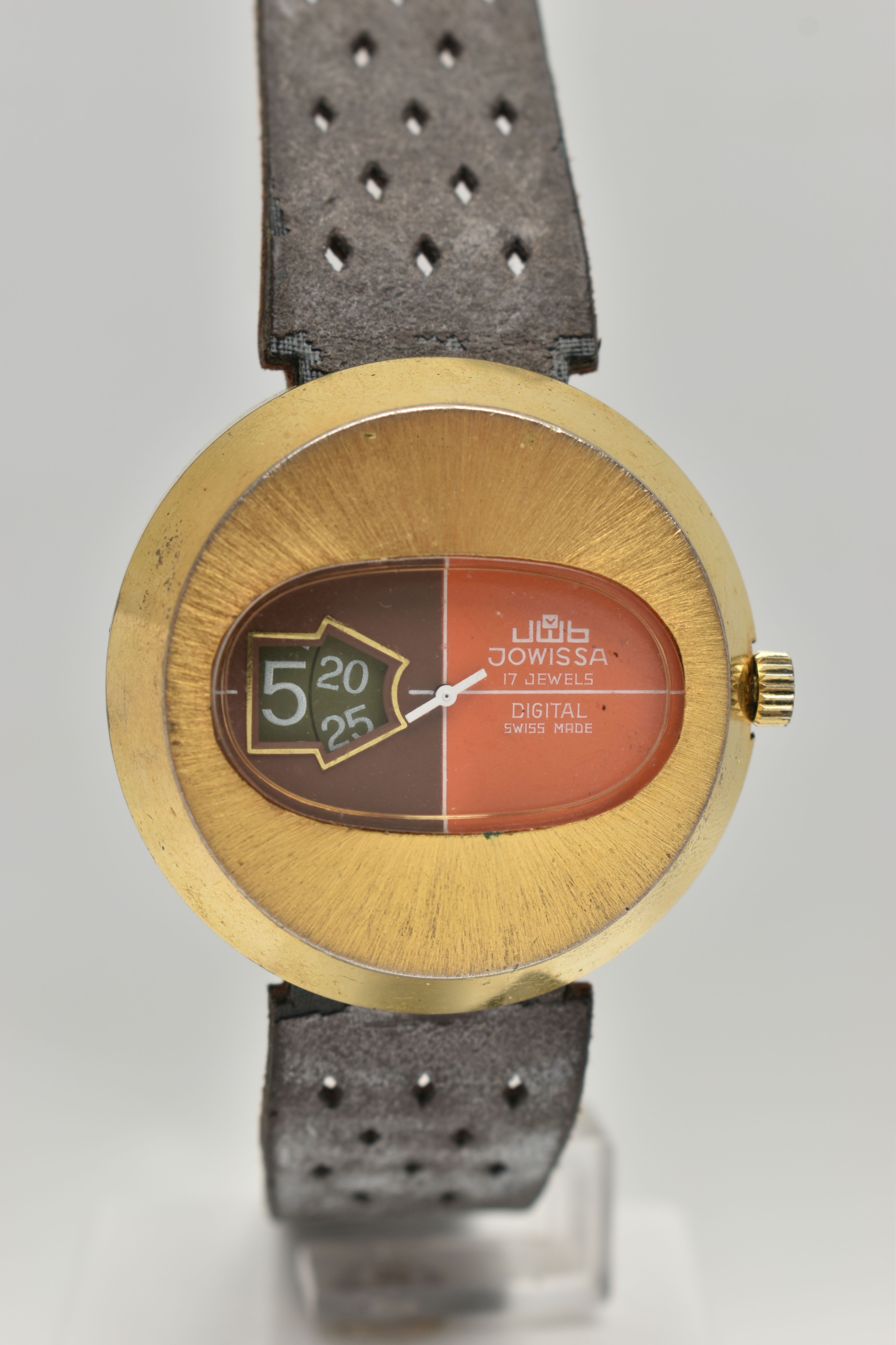 A VINTAGE JOWISSA DIGITAL WRISTWATCH, brown and orange dial with white hands, date window, the